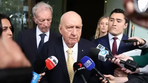 Sexual Assault Charges Against Prominent Australian Media Personality Reduced